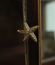 doing-goods-ruby-zeester-knop